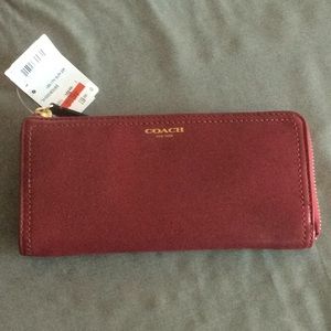 Brand new Coach burgundy leather wallet